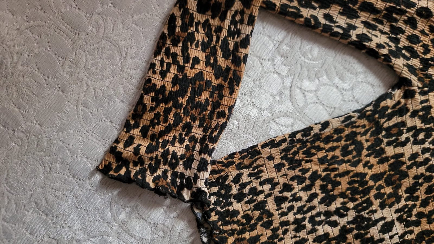 Cheetah print full-sleeve top (Online or Prepaid payment only)