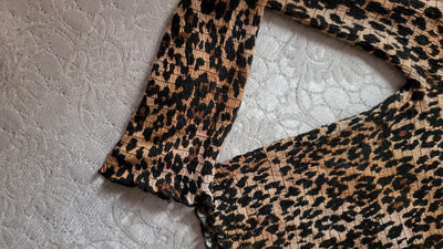 Cheetah print full-sleeve top (Online or Prepaid payment only)